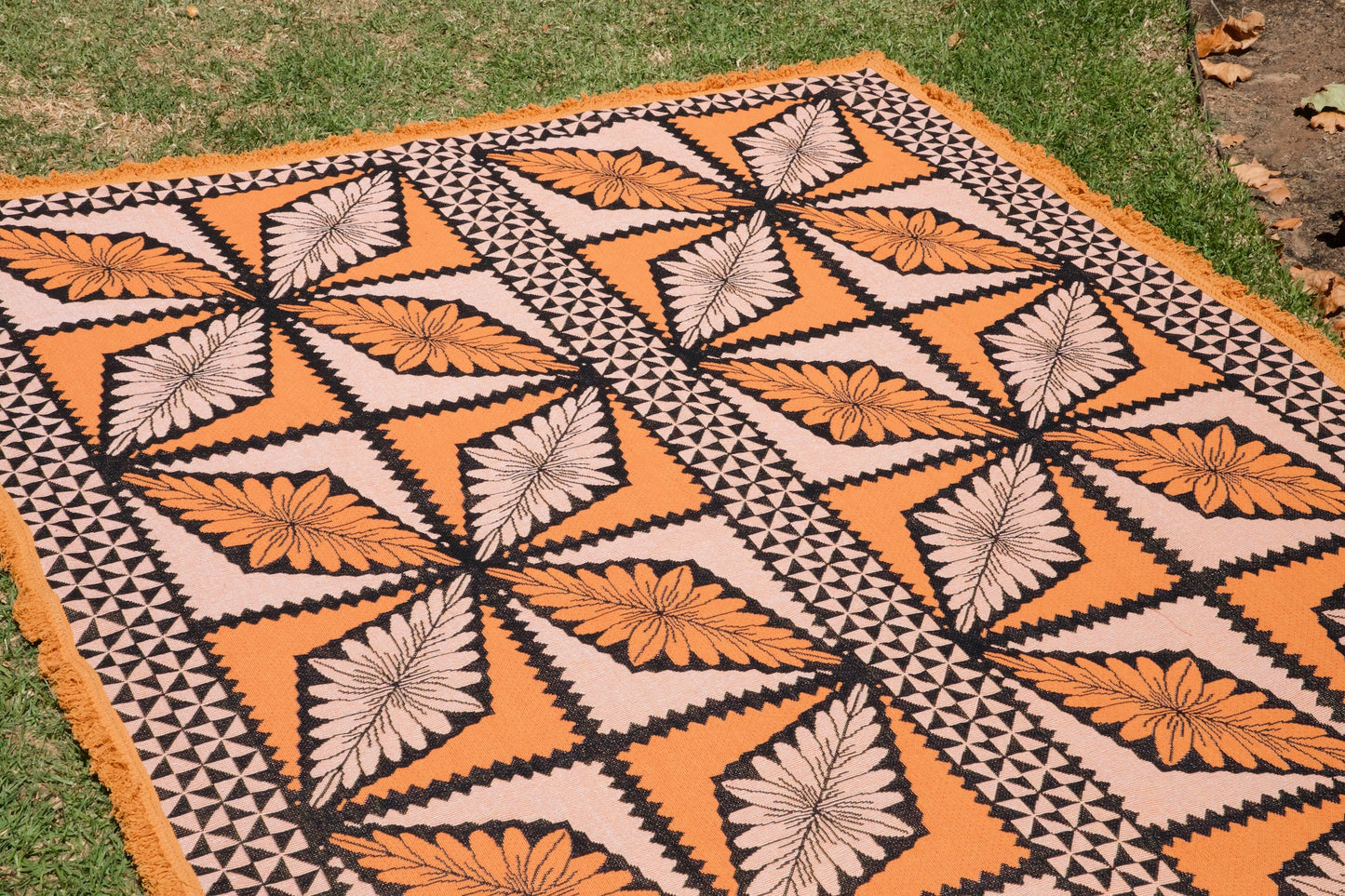 The Tapa Throw Rug
